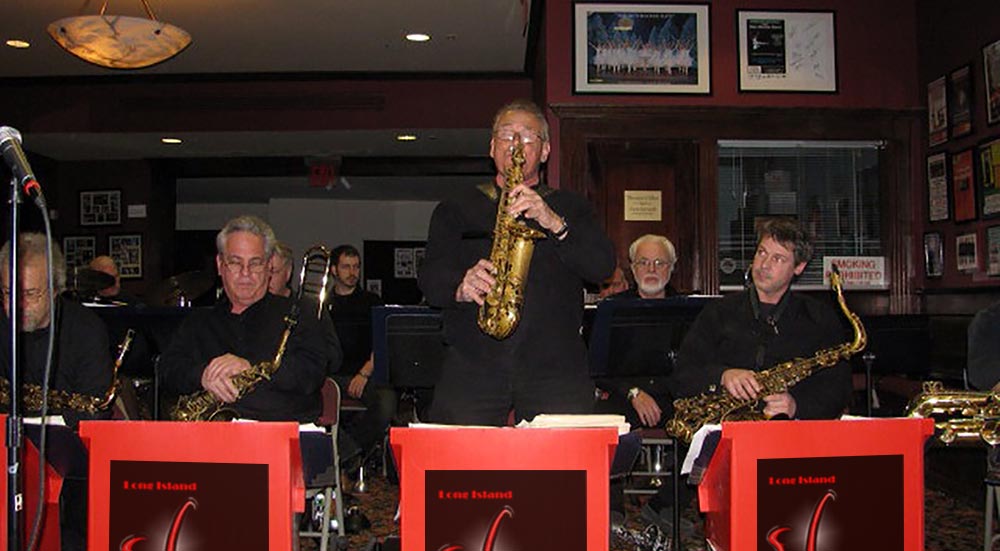 Saxophonist Mike Ficco taking a solo during a party performance.