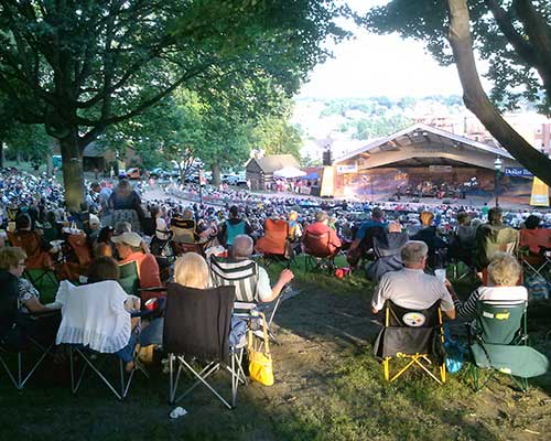 Attendees of an outdoor concert in Valley Stream, NY.